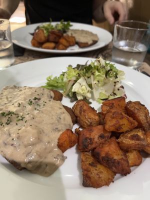 Vegan steak, mushroom sauce and fried potatoes  at Tulsi in Barcelona