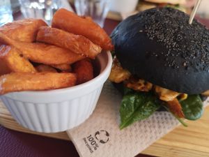 Heura burger wirh spinach, vegan cheese and fried sweet potato. at Green&Burger in Terrassa