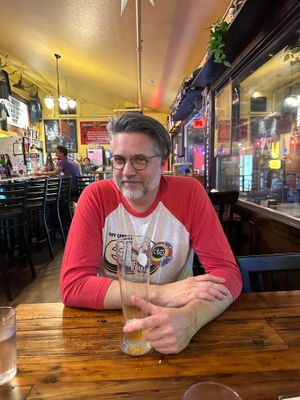A happy German food-loving boy in a cute space at Urban German Wursthaus in Portland