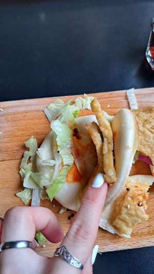 Steamed dumplings are awesome but tofu buns are bland with the smallest amount of sauce. The whole place is not very clean. at Tloft in Ljubljana