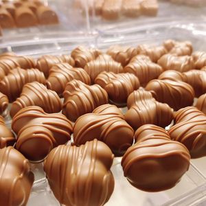 Trillingnöt: three roasted hazelnuts dipped in vegan "milk" chocolate. at Mosters Praliner in Malmo