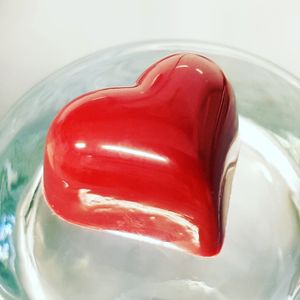 Raspberry heart with dark chocolate filling at Mosters Praliner in Malmo