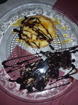 Complimentary vegan desert platter as they remembered us from coming before so go to this restaurant more than once you might get this. It was the mosaic + lemon tart which was yum at Jasmine Restaurant in Planos