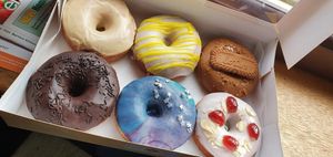 Salted Caramel, Lemon Drizzle, Biscoff, Chocolate, Vanilla and Cherry Bakewell at The Doughnut Family in Edinburgh