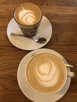 Cafe latte and white flat with almond milk   at SmetanaQ Cafe & Bistro in Prague