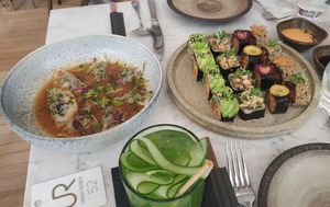 Steamed Asian Dumplings (L) and Maki Set (R) at Holy Carrot in London