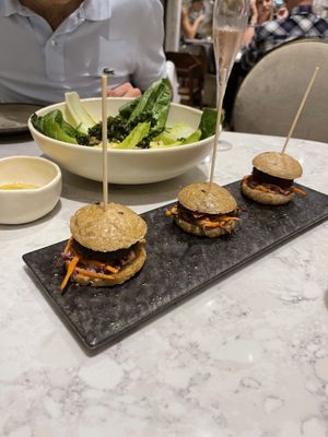 Trio on sliders at Holy Carrot in London