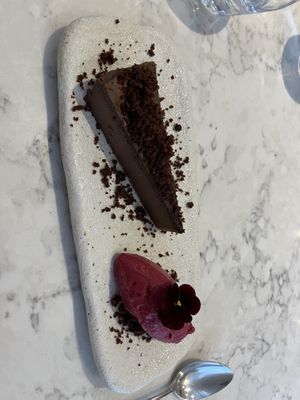“chocolate cheesecake” with raspberry and lemon sorbet  at Holy Carrot in London