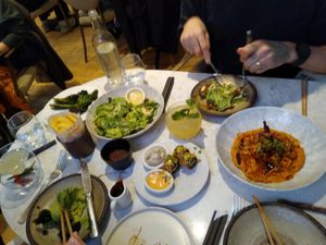 Sexy Tofu, Caesar salad, tenderstem broccoli, crispy maki, black truffle mayo with skin on chips at Holy Carrot in London