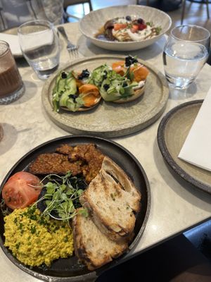 Truffled scramble tofu, smoked ‘salmon’ bagel and apple and cinnamon pancakes   at Holy Carrot in London