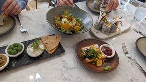 Small plates (summer rolls, flatbread, buffalo mozarella and something I can't remember) at Holy Carrot in London