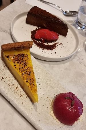 Lemon tart & Chocolate fondant at Holy Carrot in London