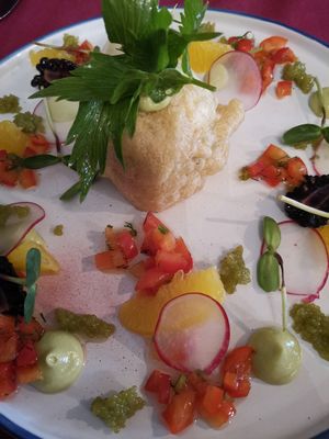 Cold Avocadocream in Tempo Dough, with Tomatoes, Oranges and Wasabi.  at Haider in Pollau