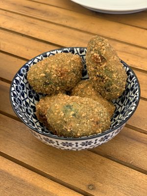 Croquetas espinacas y piñones   at Xiringuito Oblikue in Vilassar De Mar