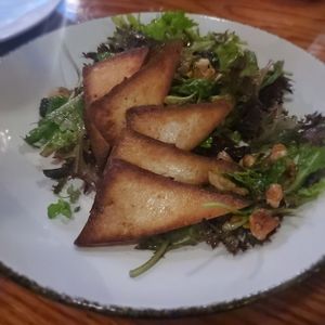 Smoked tofu on the house salad. Really good tofu! at The Cellar in Corning