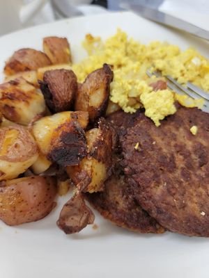 Vegan sausage, vegan eggs, vegan potatoes at Donut Villa Diner in Malden