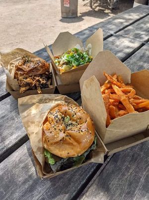 Plant pulled burger (back), American burger, loaded fries, and sweet potato fries  at World Food Trip in Zweibruecken
