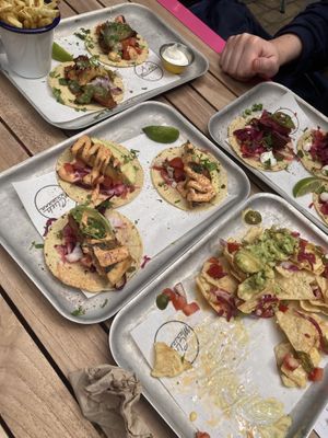 Nachos, tofish taco, al pastor taco, bbq rib taco, cheeseburger taco, chips at Club Mexicana - Soho in London