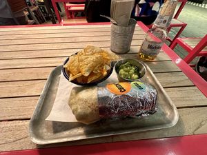Crispy Chicken Burrito, tortilla chips & guac, Modello beer  at Club Mexicana - Soho in London