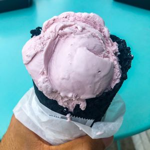 Taro in a charcoal waffle cone at Creamo in Los Angeles
