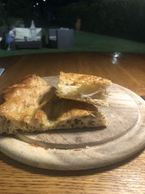 Tutto accompagnato da una focaccia speciale  at Focacceria da Francesco in Sarzana