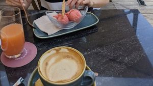 Cappuccino with oatmilk, strawberry icecream at Die Goldammer in Diessen Am Ammersee
