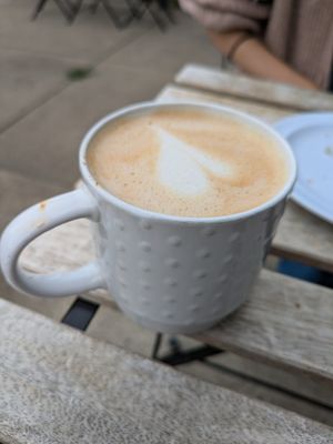Oat milk latte with pumpkin at Community Grounds in Columbus