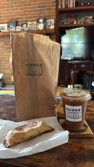 Empanadilla and cold brew with oat milkk  at Community Grounds in Columbus