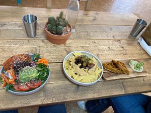 Buddha bowl, nachos and sweet potato waffles with humous.   at The Plant Bar Vegan Cafe in Barnstaple