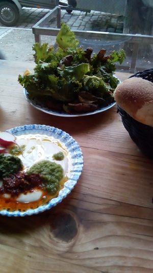 Kale with harissa and something I can't recall. Loved them both. Fluffy bread too. at Cafe Pilz in Berlin