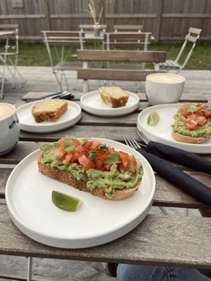 vegan avocado toast, vegan lemon cake and cappuccino with oat milk  at Twenty Twenty Coffee in Hvide Sande