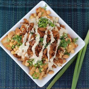 Fattet hummus, fresh chickpeas with toasted bread and soy curls at Vegantrii in Amman