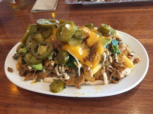 Loaded Shawommes with everything: fries, mushrooms, veganmeat, cheese, jalapeños, onions...what else do you need? Of course: hummus 😁💜 at Dominion Food Revolution in Frankfurt