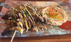 Dominion food mix: oyster mushrooms, hummus, meaty goodness, pita 💜 at Dominion Food Revolution in Frankfurt