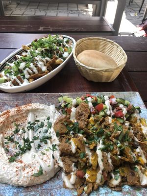 Loaded pommes and shawarma on the plate with pita bread  at Dominion Food Revolution in Frankfurt