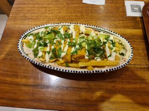 Loaded fries with schnitzel at Dominion Food Revolution in Frankfurt