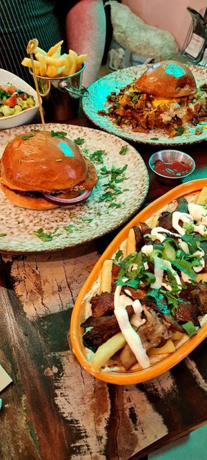 Loaded fries, burger, salad... at Dominion Food Revolution in Frankfurt