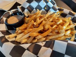 Vegan cheese fries with spicy vegan ranch on the side. at Stache International in Detroit