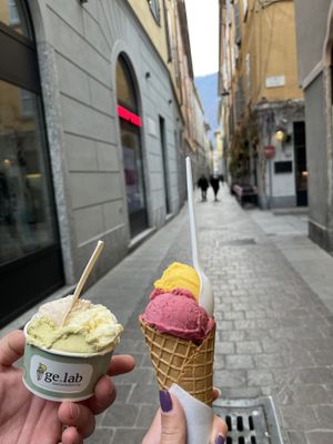 My cone has vegan chocolate, mixed berry, & mango. My husband got vegan pistachio as one of his flavors.  at Gelab Gelateria in Como
