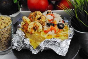 Una patata grande asada con toppings encima a tu gusto  at Patata Lab in Denia