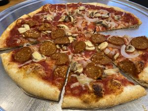 Vegan pie with onions, mushrooms and half pepperoni   at Nick's Pizza & Deli in Fanwood
