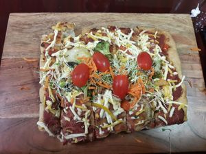 Delicious pizza! Bread was super light! at Madre Tierra in Caguas