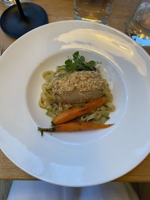 Linguine with zucchini, crispy tofu with almonds and carrots  at Restavracija Sunrose 7 in Bohinjska Bistrica