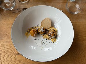 Pumpkin doughnuts with vanilla cream and oat crunch  at Restavracija Sunrose 7 in Bohinjska Bistrica