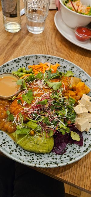 Bowl with schnizel added on top at Seed in Luxembourg City