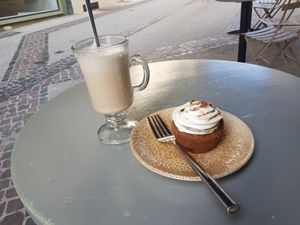 Chocolate chai with oat milk, choco-passionfruit muffin. at Seed in Luxembourg City