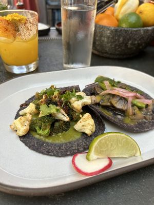 Vegetable Mole and Mushroom Tacos without cheesee  at Puesto At The Headquarters in San Diego
