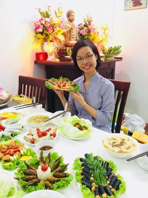 Owner with her amazing food at Van Phong in Hanoi