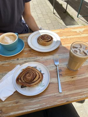 Cinnamon buns and coffee - you can take the food downstairs and eat outside if you want  at Café Mellemfolk in Aarhus