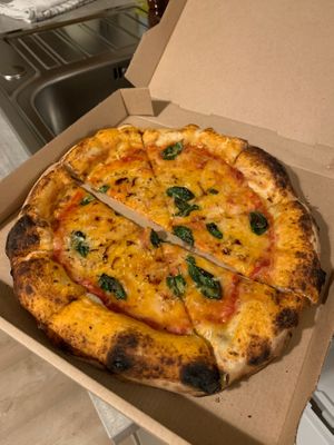 Margherita pizza with vegan cheese. at Boxed Woodfire Pizza in Kenmare